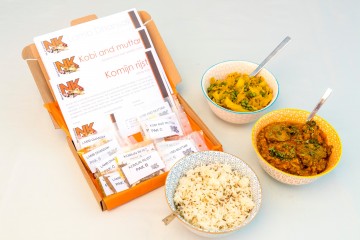 Lam & linzencurry met groenekool-tuinerwtencurry en komijnrijst